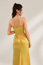 A woman stands against a light background, wearing a yellow satin gown. It features a strapless sweetheart neckline, a figure - hugging silhouette, and a high side slit. The draped details on the skirt add elegance, creating a glamorous look perfect for formal events like galas or evening parties.6