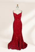 photograph of a mannequin wearing a red sequin evening gown, full-length, floor-length, sleeveless, V-neck, fitted bodice, flared skirt, glossy texture, elegant, glamorous, fashion, studio lighting, white background, soft shadows, high-end fashion, no accessories, no jewelry, no shoes, no face, no hair, no makeup, no background details, simple composition, focus on dress, no people, no textures, no patterns, no objects.01