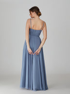 Dusty blue chiffon bridesmaid dress with spaghetti straps and pleated back, gathered waist