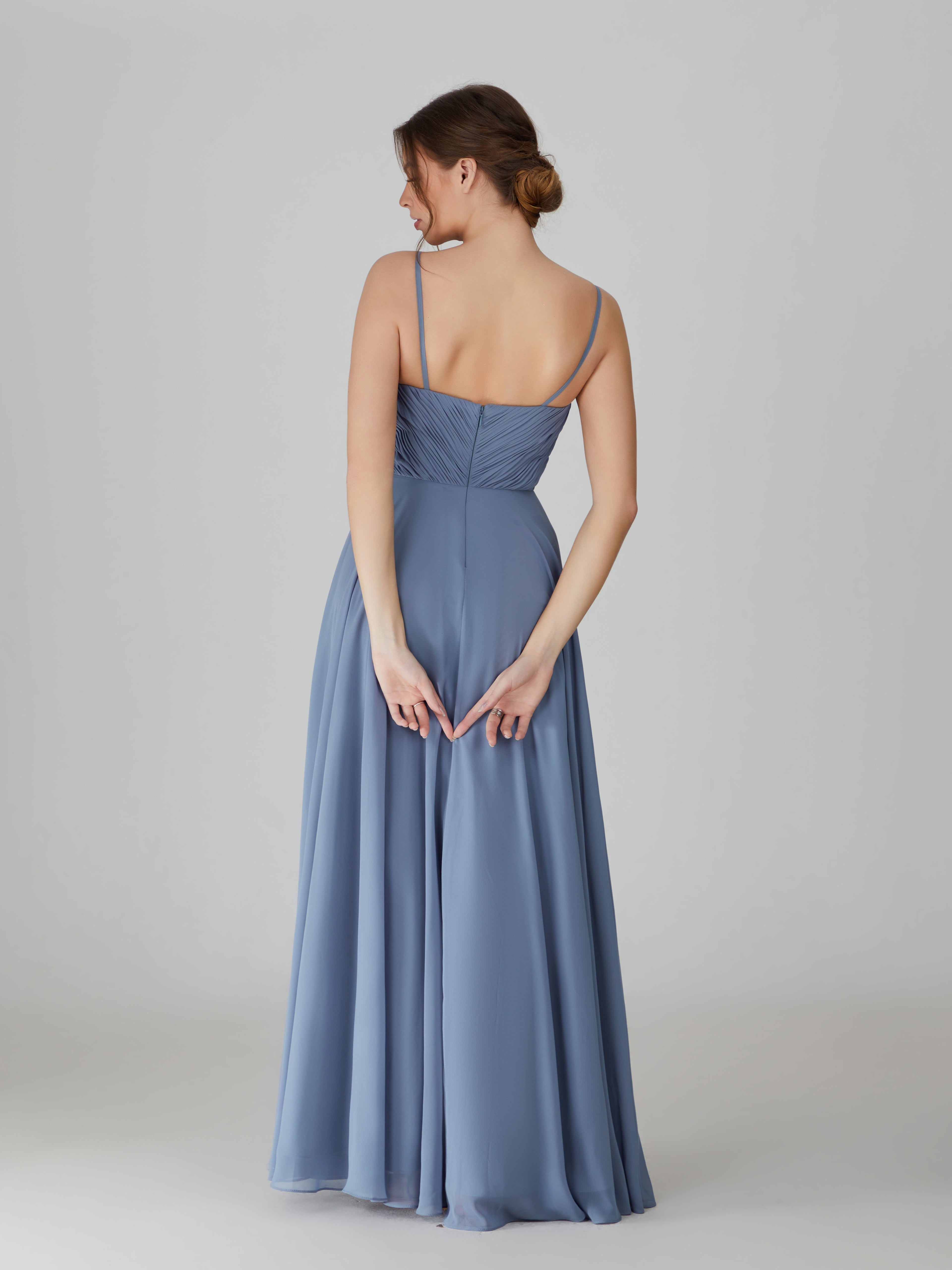 Dusty blue chiffon bridesmaid dress with spaghetti straps and pleated back, gathered waist