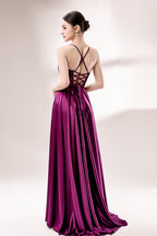 photograph, elegant woman, standing, studio lighting, white background, full-length shot, wearing a floor-length, deep purple satin gown, lace details, spaghetti straps, high slit on one side, hands on hips, brown hair in a sleek updo, red lipstick, soft shadows, minimalistic setting, fashion photography, evening wear, classy, sophisticated, stylish, modern, feminine, confident pose, high-quality image, no visible watermark.33116B-02