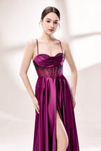 photograph, elegant woman, standing, studio lighting, white background, full-length shot, wearing a floor-length, deep purple satin gown, lace details, spaghetti straps, high slit on one side, hands on hips, brown hair in a sleek updo, red lipstick, soft shadows, minimalistic setting, fashion photography, evening wear, classy, sophisticated, stylish, modern, feminine, confident pose, high-quality image, no visible watermark.33116B-04