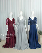 Mother-of-the-bride dresses on mannequins: burgundy, silver, and navy lace chiffon