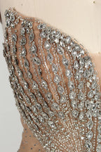 Close-up of silver beaded embellishment on V-neck halter bodice