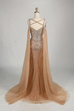 Backless champagne mermaid dress with crisscross straps and beadwork