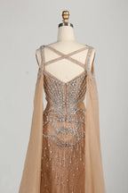 Back view: crisscross strap champagne mermaid dress with full tulle panels
