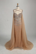 Front view: beaded halter champagne mermaid gown with draped sleeve capes