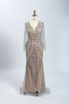 Silver-beaded V-neck mermaid gown with sheer long sleeves and fitted tulle skirt