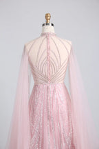 Back view of blush pink crystal-beaded bodice with sheer cape sleeves