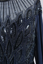 Beaded chiffon bodice with leaf and fan bead patterns on navy dress