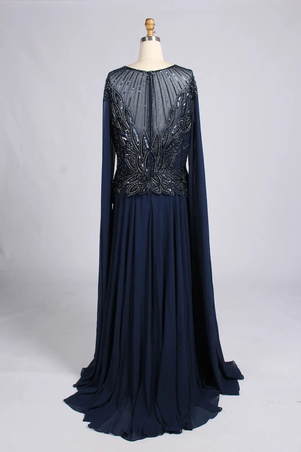Navy A-line chiffon gown with beaded back yoke and long sleeves