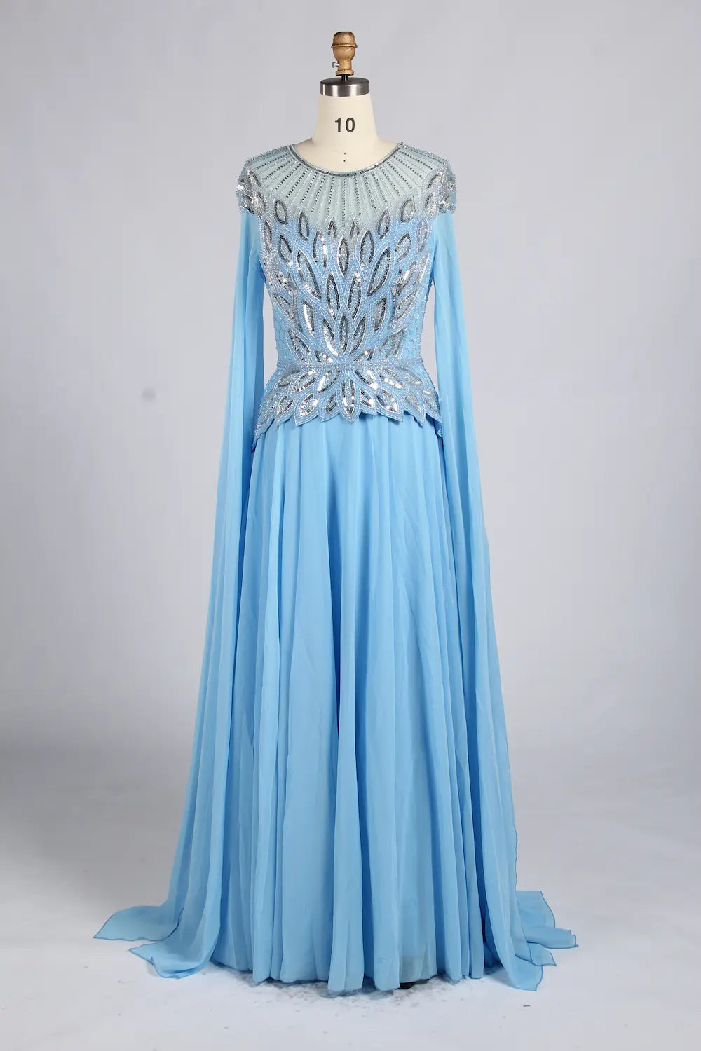 Light blue A-line chiffon gown with beaded crew neckline and long sleeves