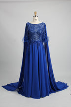 Blue sequin evening dress with cape sleeves and feather-trim cuffs, flowing skirt