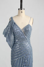Blue asymmetric one-shoulder beaded gown with draped sleeve detail