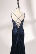 This is a floor - length evening dress in a deep navy hue. It has a strapless style with thin shoulder straps. The bodice is embellished with delicate beadwork and embroidery, creating an elegant and glamorous look. The skirt is form - fitting around the hips and flows down to the floor, featuring a side slit that adds allure and allows for easy movement. Displayed on a mannequin against a simple, light - colored backdrop, the dress exudes sophistication, perfect for special occasions like galas or proms.06
