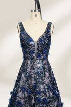 This is an evening gown displayed on a mannequin. It features a deep V - neckline and a sleeveless design. The dress is adorned with numerous blue three - dimensional floral embroideries and black patterns across the bodice and the floor - length skirt. The wide, trailing skirt creates an elegant and formal appearance, making it perfect for occasions such as dinners and balls.03