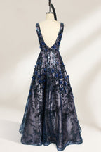 This is an evening gown displayed on a mannequin. It features a deep V - neckline and a sleeveless design. The dress is adorned with numerous blue three - dimensional floral embroideries and black patterns across the bodice and the floor - length skirt. The wide, trailing skirt creates an elegant and formal appearance, making it perfect for occasions such as dinners and balls.02