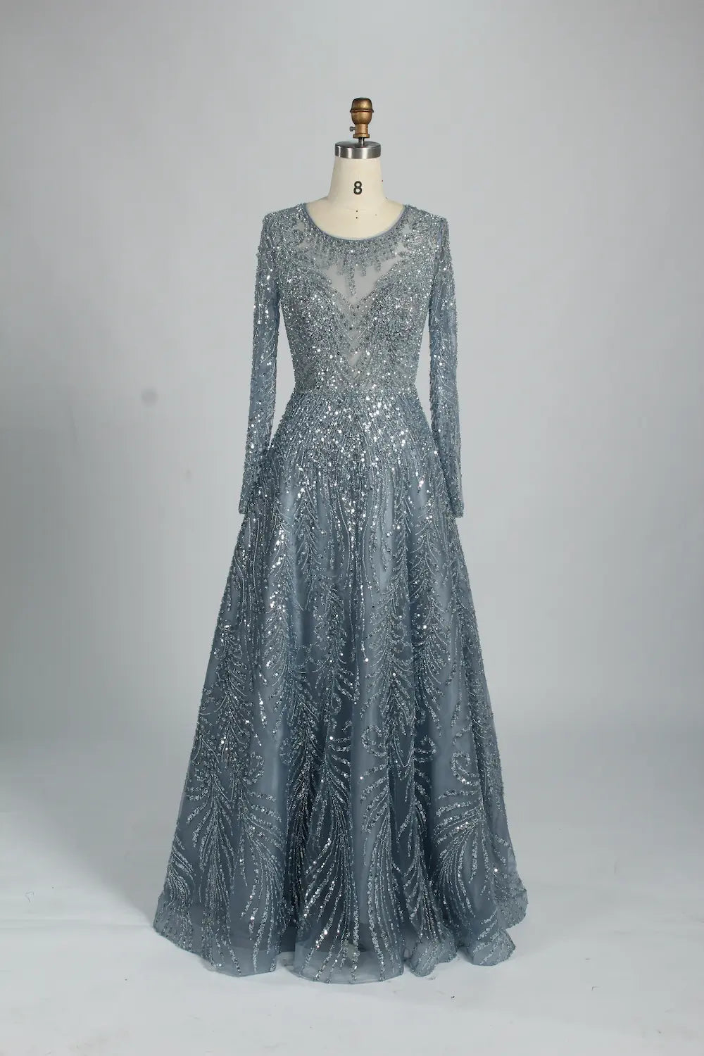 Sparkly illusion long-sleeve A-line mother of the bride dress, V-neck, teal-silver beading.