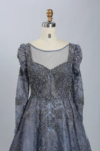 Dark blue beaded V-neck illusion bodice with puffed long illusion sleeves