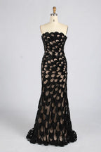 Strapless mermaid evening dress with black sequin feather pattern and gold-tone accents