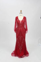 Red beaded V-neck mermaid gown with sheer long sleeves and fitted tulle skirt