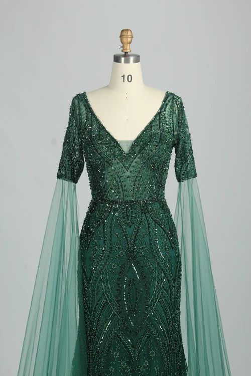 Embellished V-neck mermaid dress with short cape sleeves and dark green sequin pattern