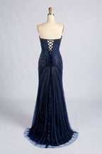 Navy strapless beaded mermaid prom dress with crisscross open back