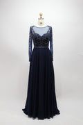 Navy blue long-sleeve dress with beaded lace illusion neckline and pleated skirt