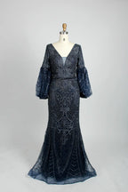 Beaded A-line cape gown in dark navy with V-neck and elbow puff sleeves
