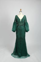 Emerald green sequin mermaid evening gown with V-neck and long puff sleeves