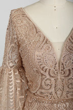 Beaded V-neck cape bodice in nude blush with ornate geometric embroidery detail