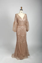 Beaded A-line cape gown in nude blush with V-neck and gathered balloon sleeves