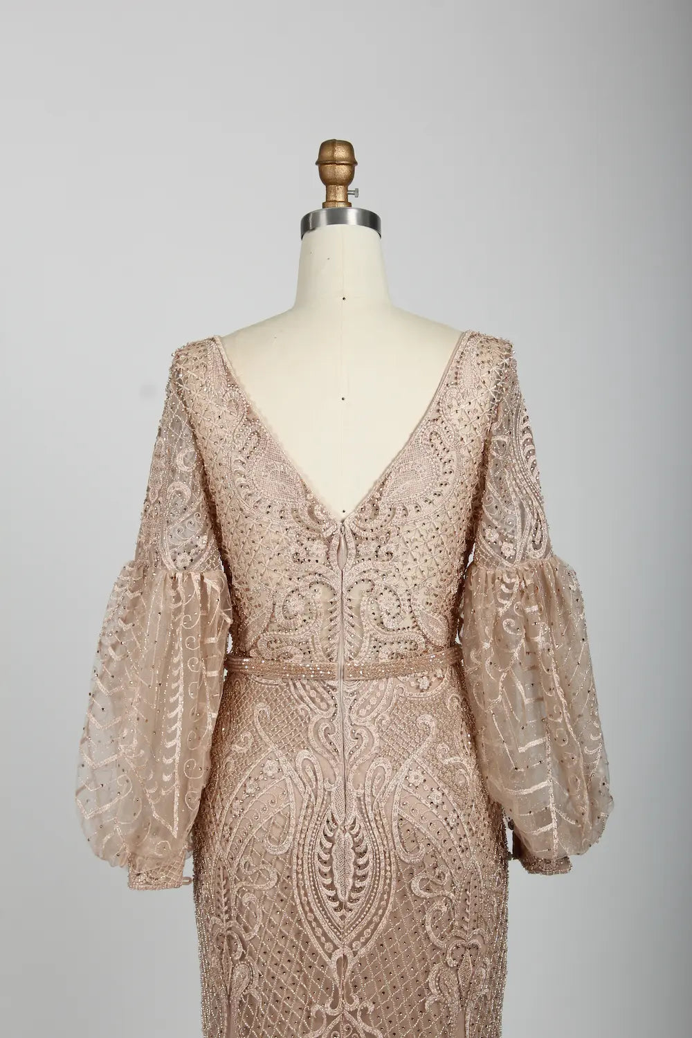 Beaded V-neck cape bodice in nude blush with intricate scrollwork pattern