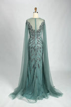 Teal beaded tulle cape mermaid evening dress with flowing tulle skirt