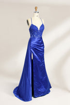 A mannequin showcases a royal - blue gown with thin straps. The bodice features intricate bead embroidery and sheer panels, while the skirt has a ruched design and a high side slit. The satin fabric and elegant details make it perfect for formal events like proms or galas, exuding sophistication.3