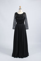 Black long-sleeve mother-of-the-bride dress with beaded sequin bodice and full skirt
