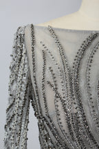 Backless silver-grey beaded long-sleeve evening dress with deep V bead straps