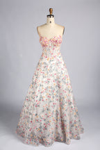 Strapless floral appliqué corset A-line prom dress with fitted bodice and full skirt