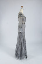 Grey tulle mermaid mob dress with silver beaded fitted bodice and bell sleeves