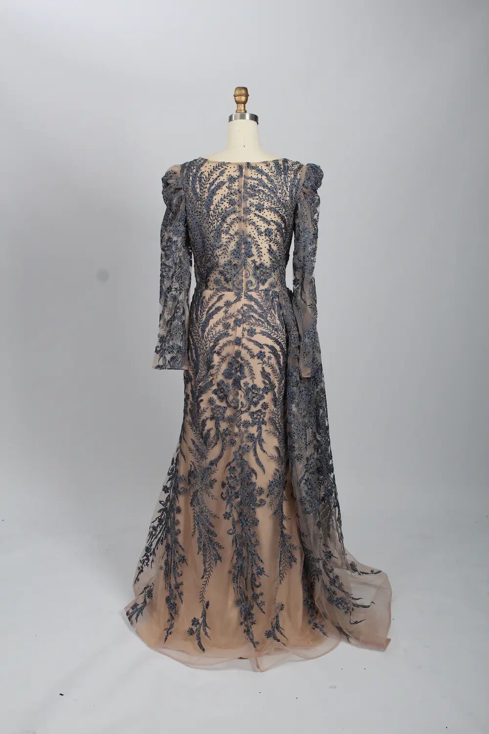 Navy lace mermaid formal dress with long sleeves and full-length sheer overlay