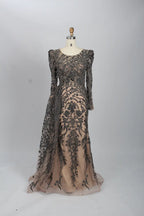 Navy lace mermaid gown with long sleeves and floor-length sheer lace overlay
