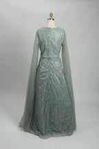 Teal beaded A-line evening dress with long sheer sleeves and fitted waist