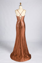 Terracotta beaded mermaid evening gown with crisscross back straps and a floor-length skirt