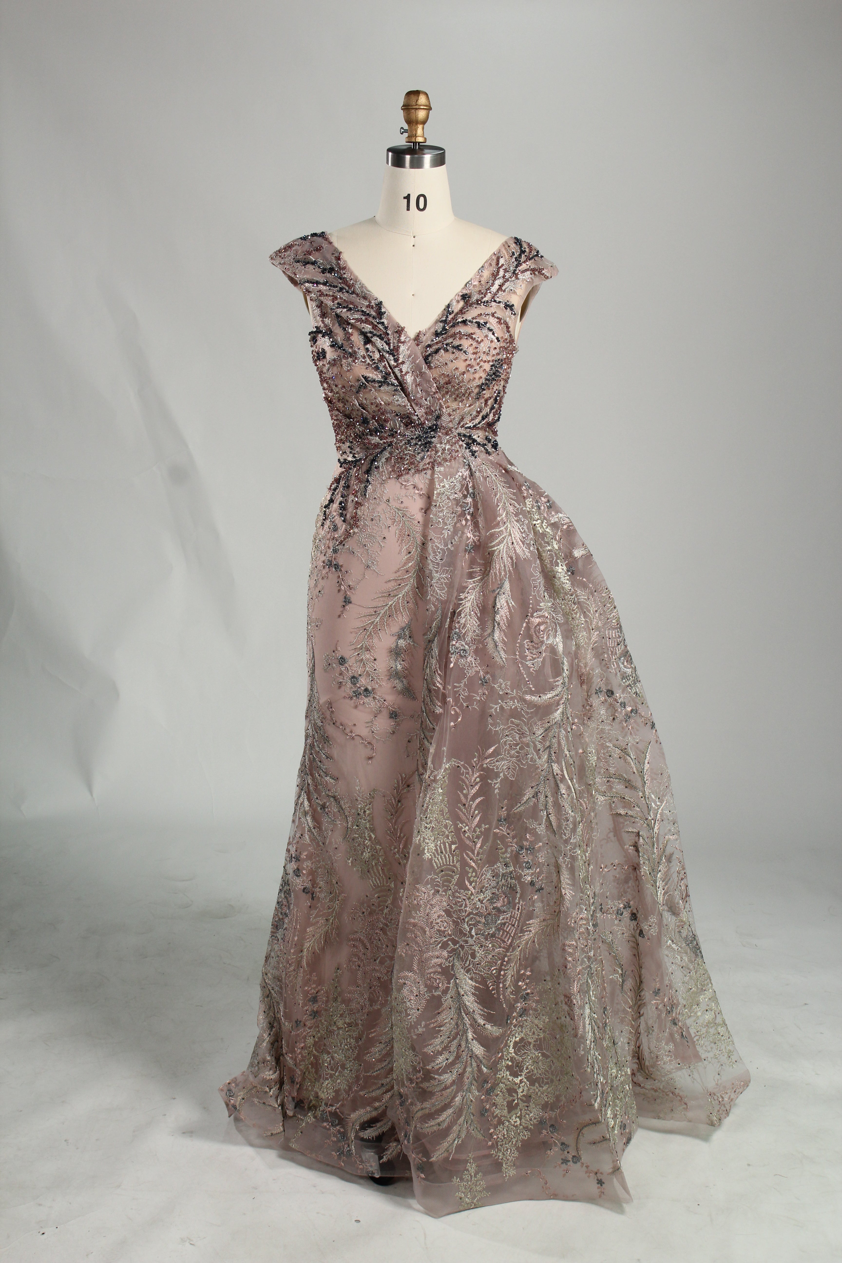 Blush pink sleeveless evening dress with V-neck beaded bodice and full skirt