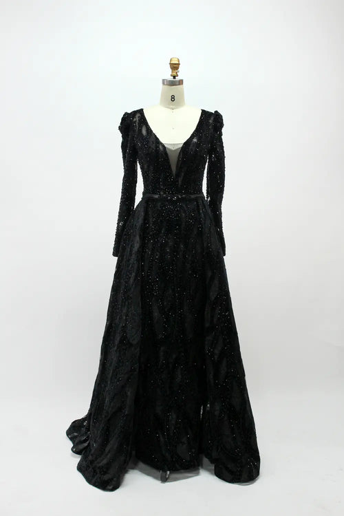 Black long-sleeve sequin evening dress with V-neck and flowing skirt