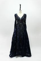 Navy blue long-sleeve sequin evening dress with V-neck and gathered skirt