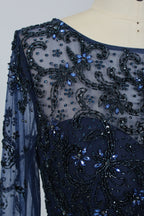 Navy tulle long-sleeve gown back with ornate beading and geometric beadwork