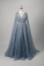 Beaded A-line mother-of-the-bride dress with V neckline, long sheer cape sleeves, light blue sparkle