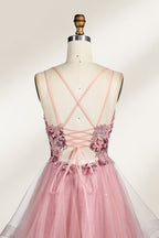 A mannequin displays a pink tulle gown. It features thin straps, a sweetheart neckline, intricate floral appliqués with sequins on the bodice, and a multi - layered, ruffled tulle skirt. The elegant design creates a romantic and glamorous look, perfect for formal events like proms or weddings.5