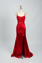 This is a floor - length evening dress in a deep navy hue. It has a strapless style with thin shoulder straps. The bodice is embellished with delicate beadwork and embroidery, creating an elegant and glamorous look. The skirt is form - fitting around the hips and flows down to the floor, featuring a side slit that adds allure and allows for easy movement. Displayed on a mannequin against a simple, light - colored backdrop, the dress exudes sophistication, perfect for special occasions like galas or proms.08